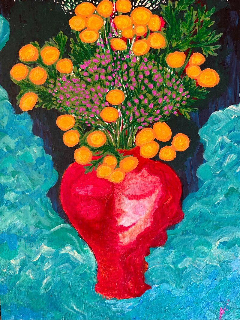 Flores naranjas en jarrón rojo — álmica